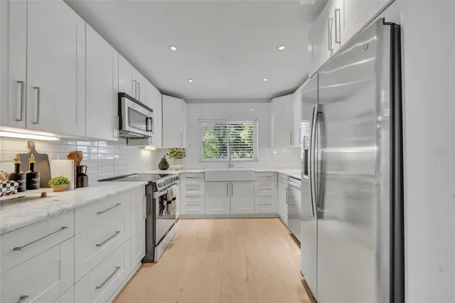 $1,097,000 | 1901 Lake Sue Drive, Orlando, FL 32803