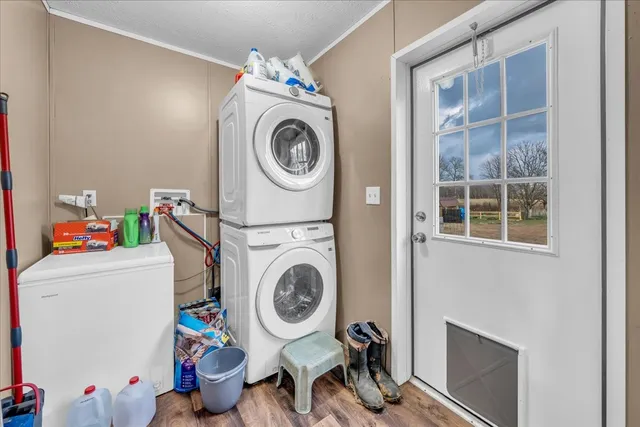 a view of a lake with houses in the back