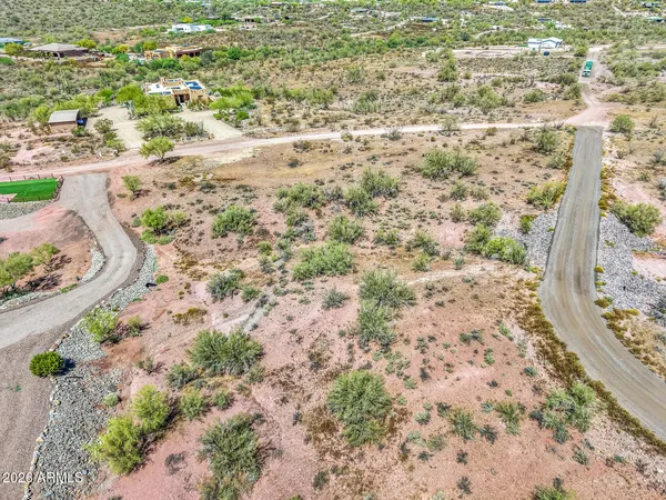 a view of a yard with a mountain view