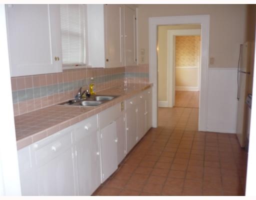 421 Cole Street Corpus Christi, TX 78404 - Photo 6 of 10 a kitchen with a sink and cabinets