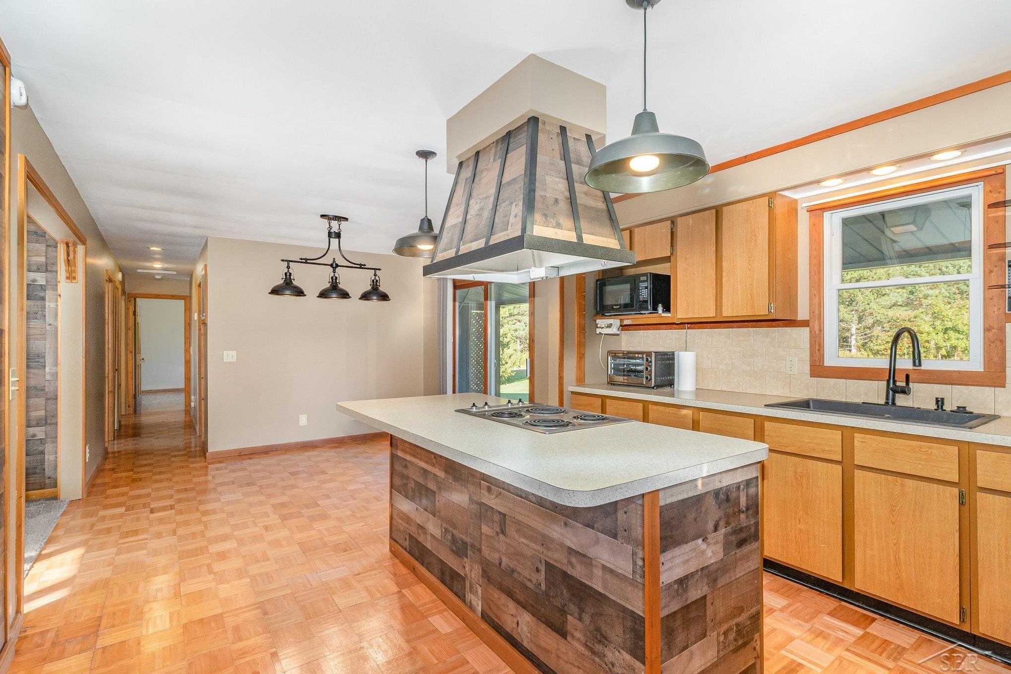 13245 Gasper Road St. Charles, MI 48655 - Photo 11 of 28 Island View into Dining R