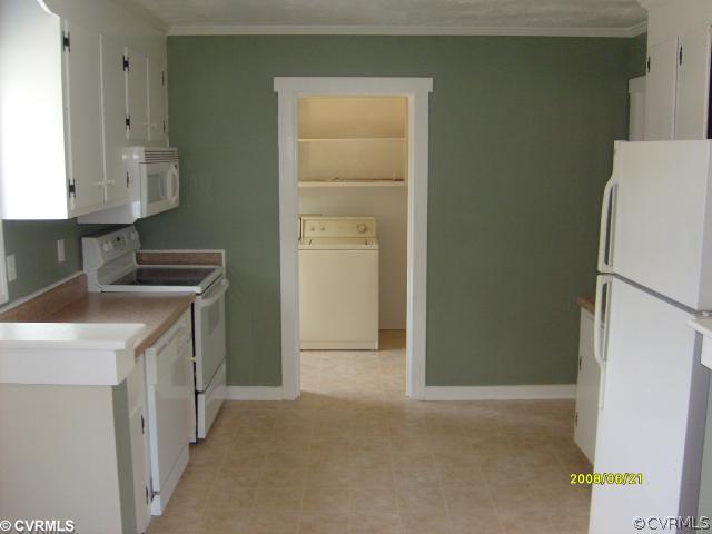 8008 Valencia Road Chesterfield, VA 23832 - Photo 3 of 4 a kitchen with a refrigerator sink washer and dryer
