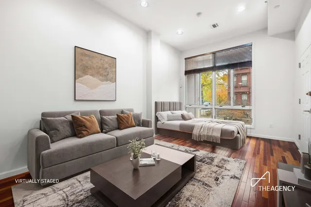 a living room with furniture and a couch