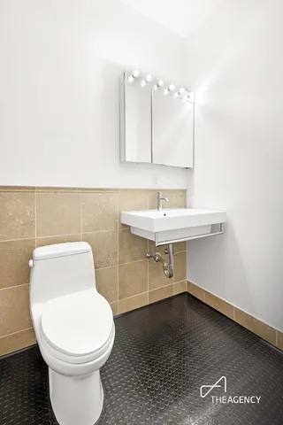 a bathroom with a sink and a toilet