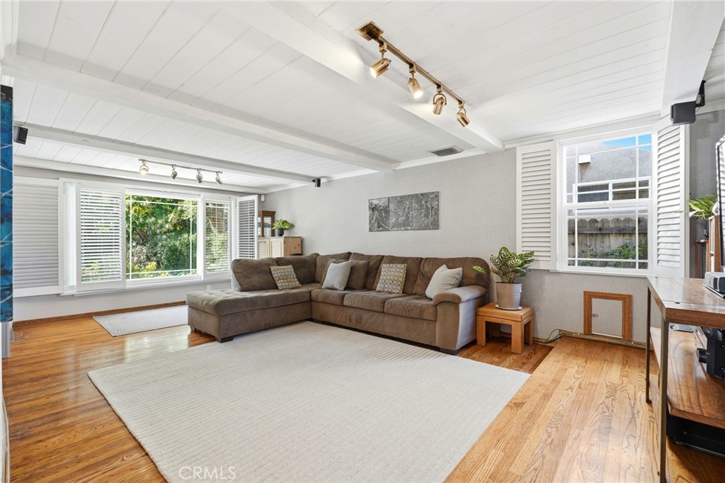 4963 Haskell Avenue Encino, CA 91436 - Photo 18 of 45 a living room with furniture and a large window