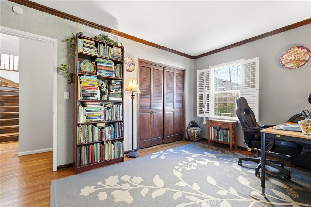 4963 Haskell Avenue Encino, CA 91436 - Photo 19 of 45 a view of a workspace with furniture and a window
