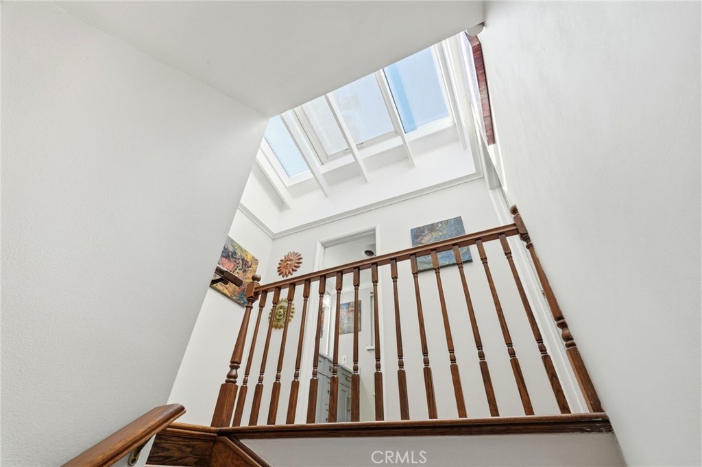 4963 Haskell Avenue Encino, CA 91436 - Photo 22 of 45 a view of staircase with white walls