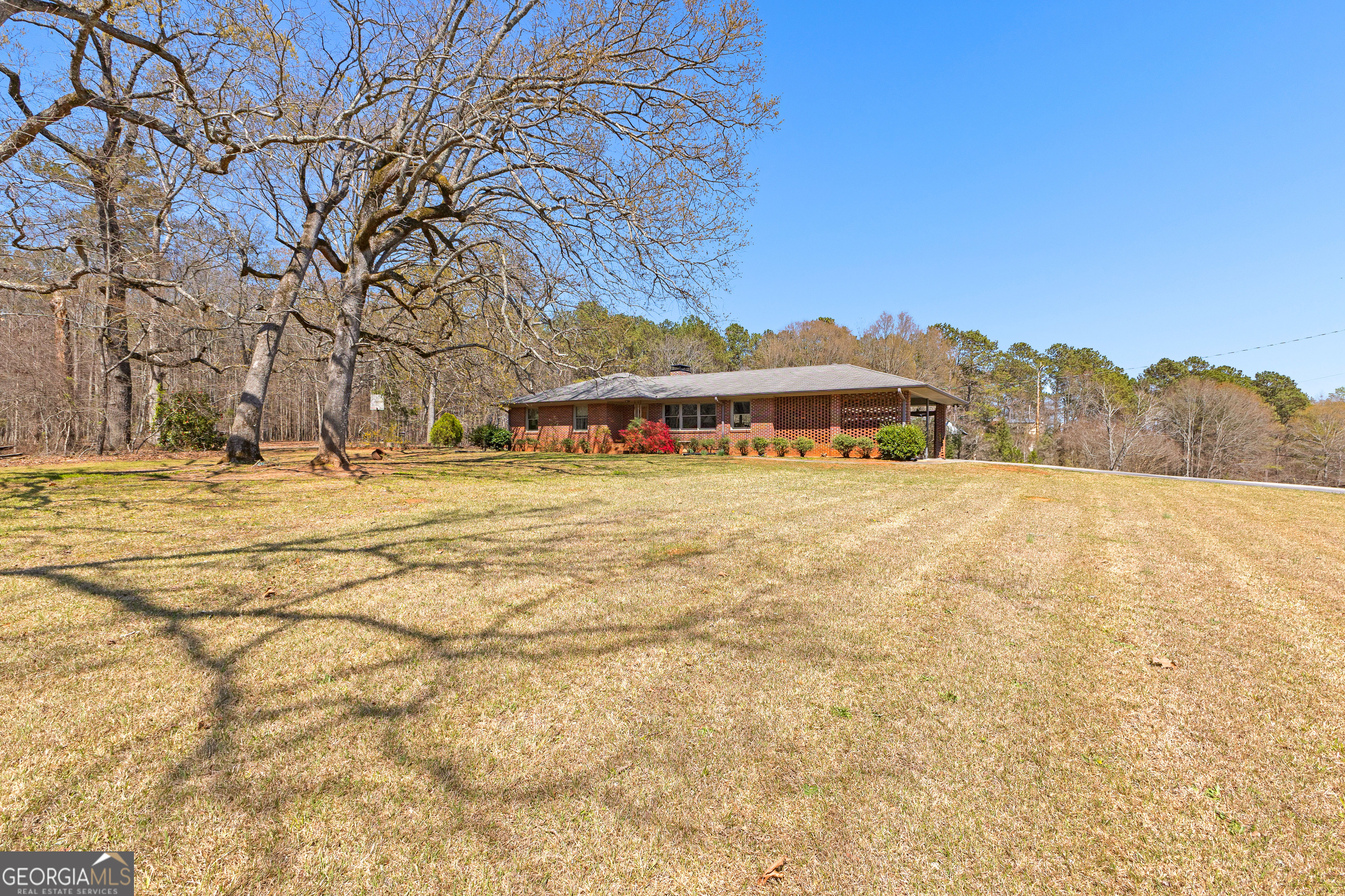 461 Old Jackson Road McDonough, GA 30252 - Photo 3 of 41 a view of swimming pool with an outdoor space
