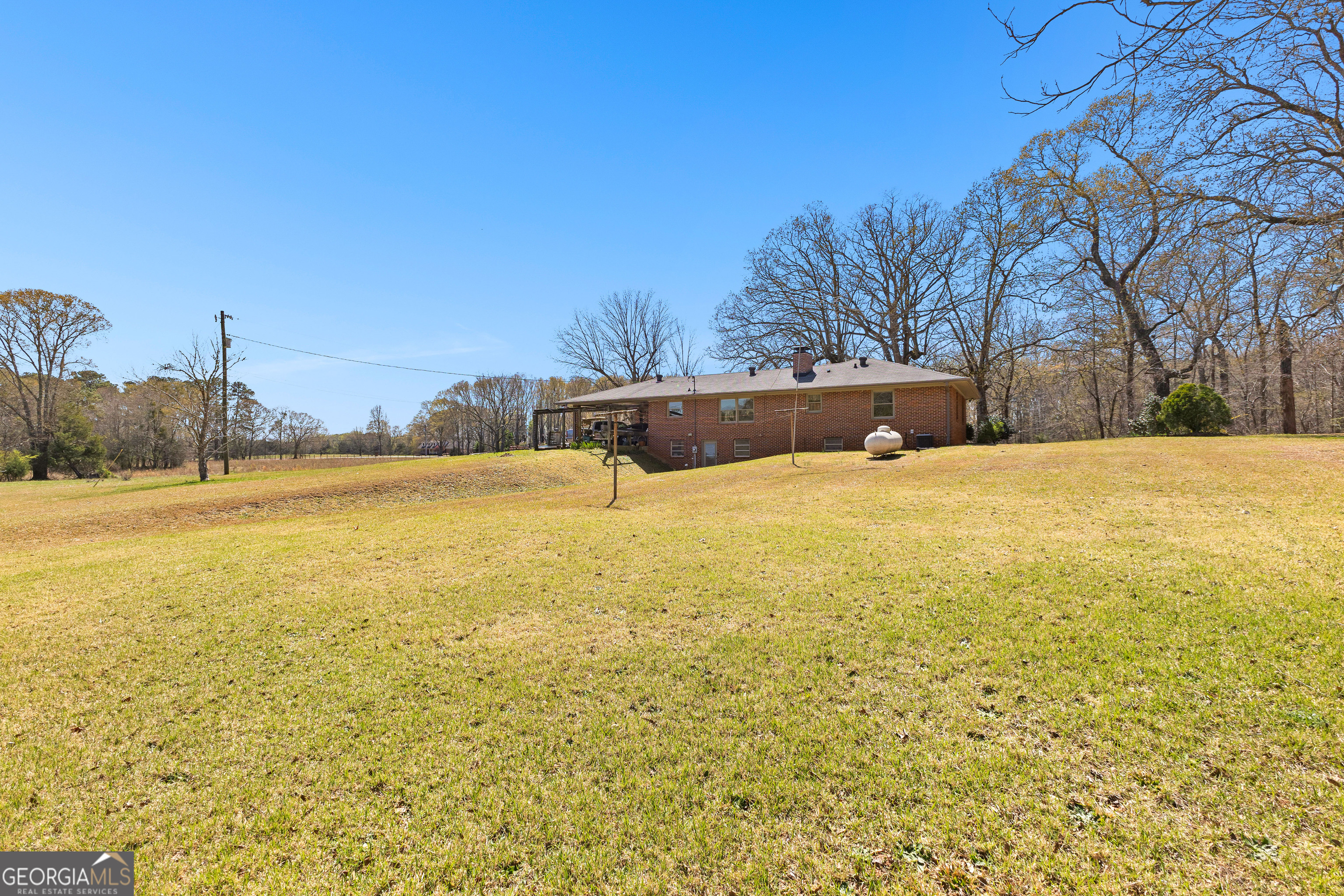 461 Old Jackson Road McDonough, GA 30252 - Photo 4 of 41 a view of an outdoor space and swimming pool