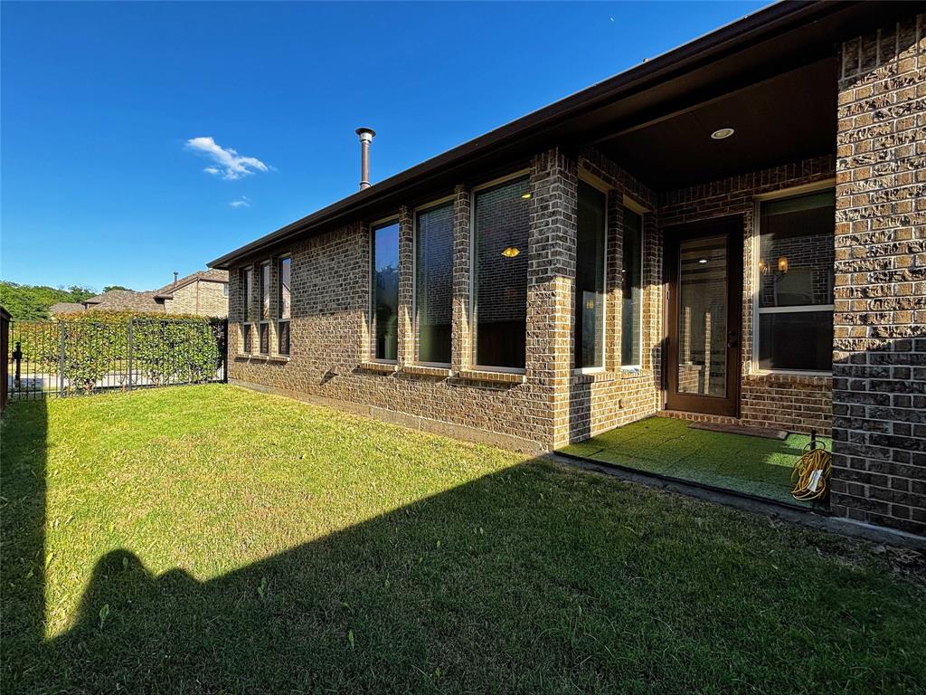 3037 Crestwater Ridge Keller, TX 76248 - Photo 23 of 25 a view of a house with backyard and porch