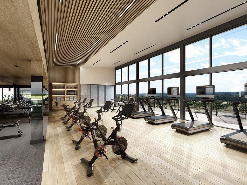 570 Bedford Road, Unit 61C Armonk, NY 10504 - Photo 21 of 36 a view of a room with gym equipment