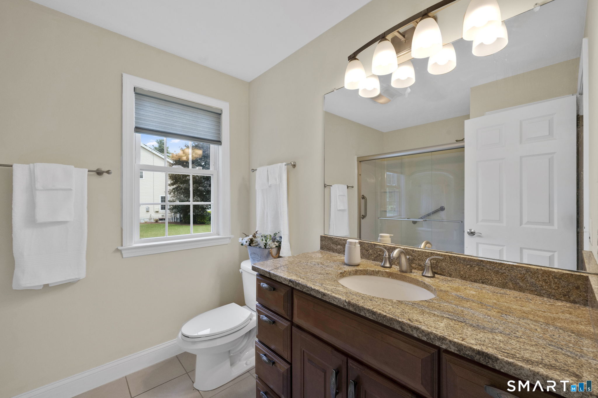 5 Edwards Way Bloomfield, CT 06002 - Photo 19 of 40 Full bathroom with tub and shower, granite counters and custom cabinetry.
