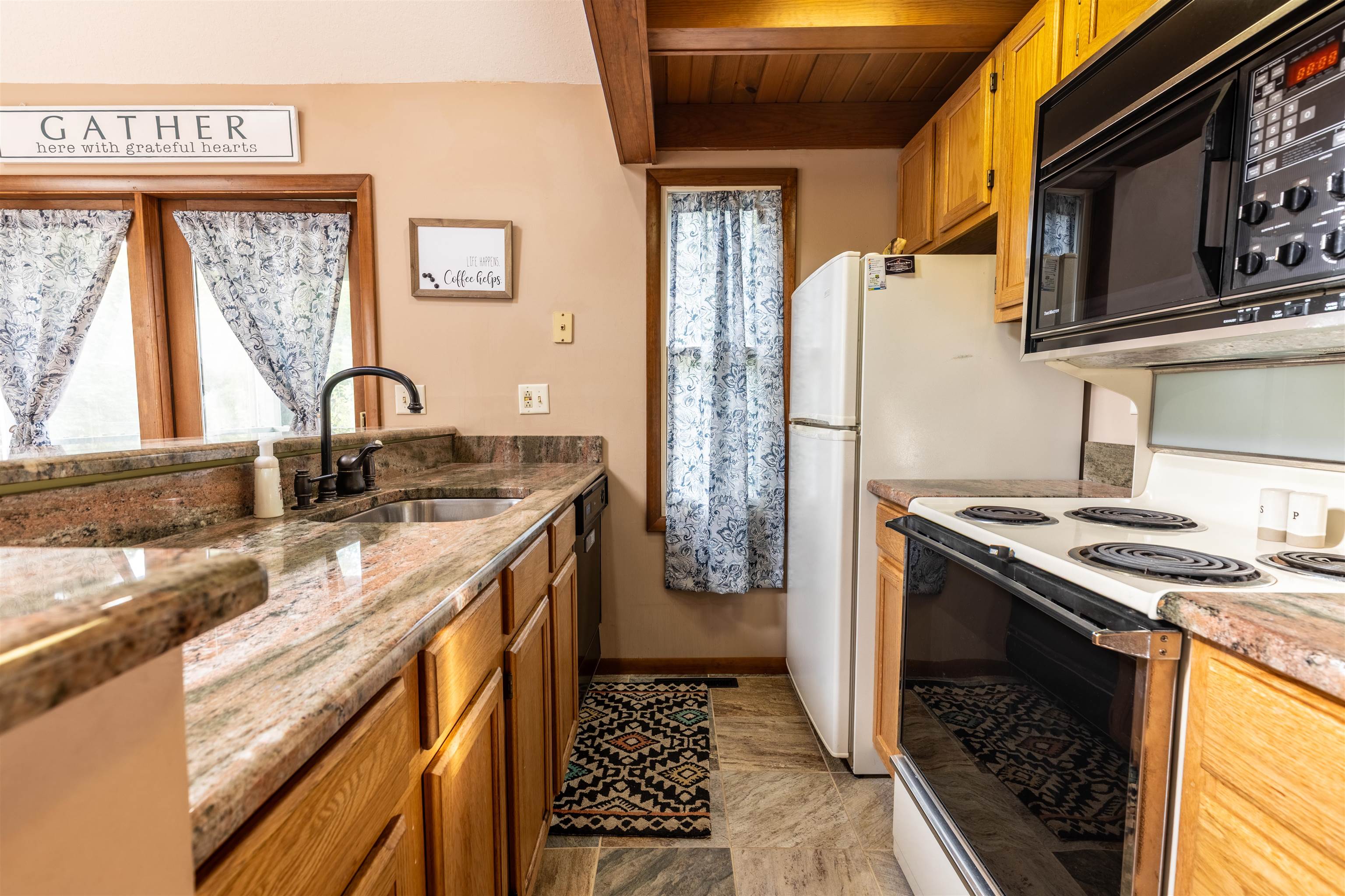14 Timberon Trail Galena, IL 61036 - Photo 12 of 31 a kitchen with a stove and a sink