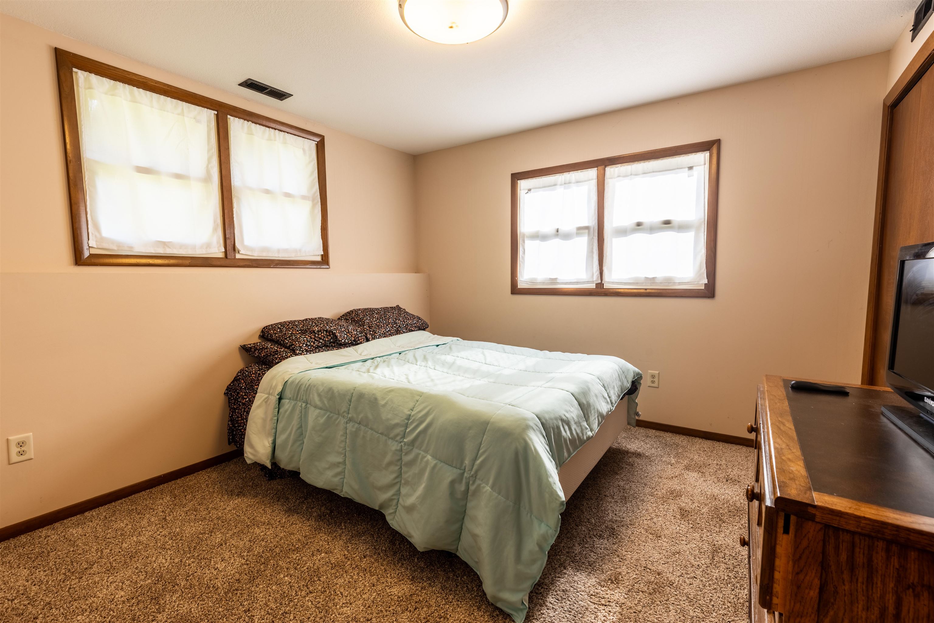 14 Timberon Trail Galena, IL 61036 - Photo 13 of 31 a bedroom with a bed and wooden floor