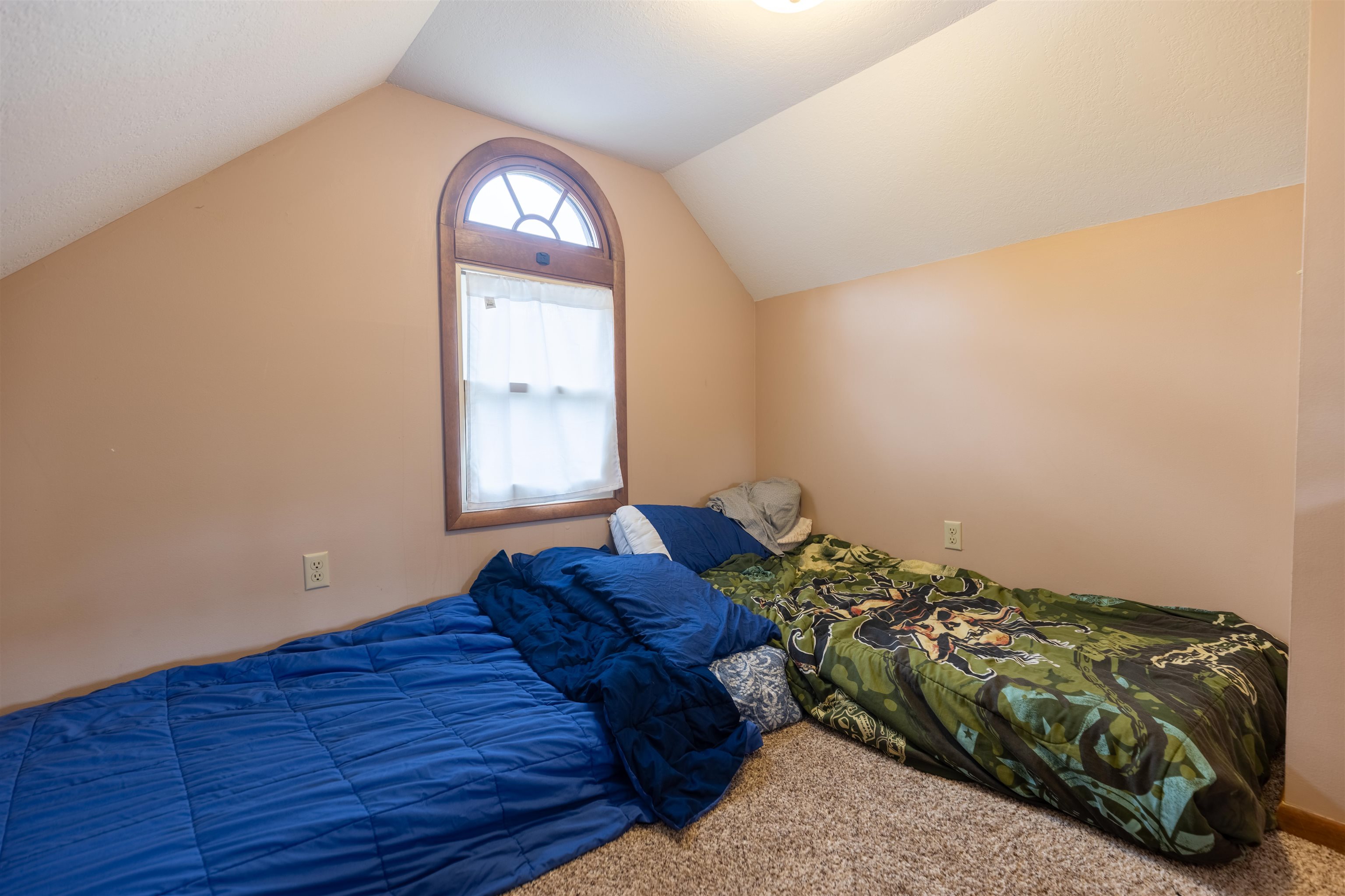 14 Timberon Trail Galena, IL 61036 - Photo 15 of 31 a bed sitting in a bedroom next to a window