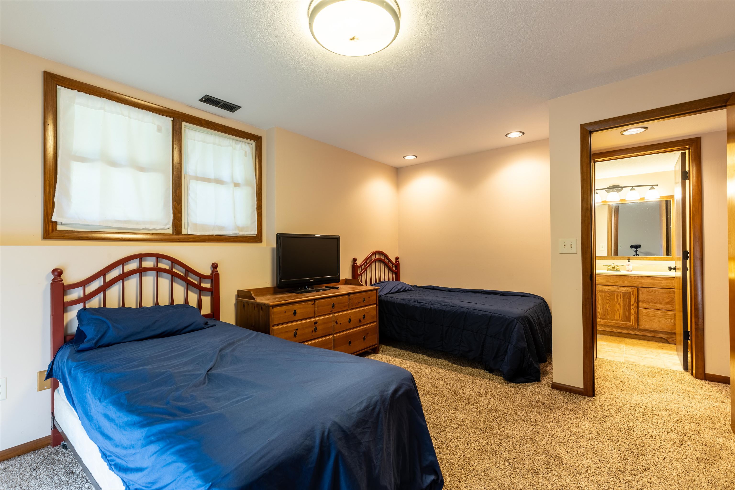 14 Timberon Trail Galena, IL 61036 - Photo 16 of 31 a bedroom with a bed and a flat screen tv