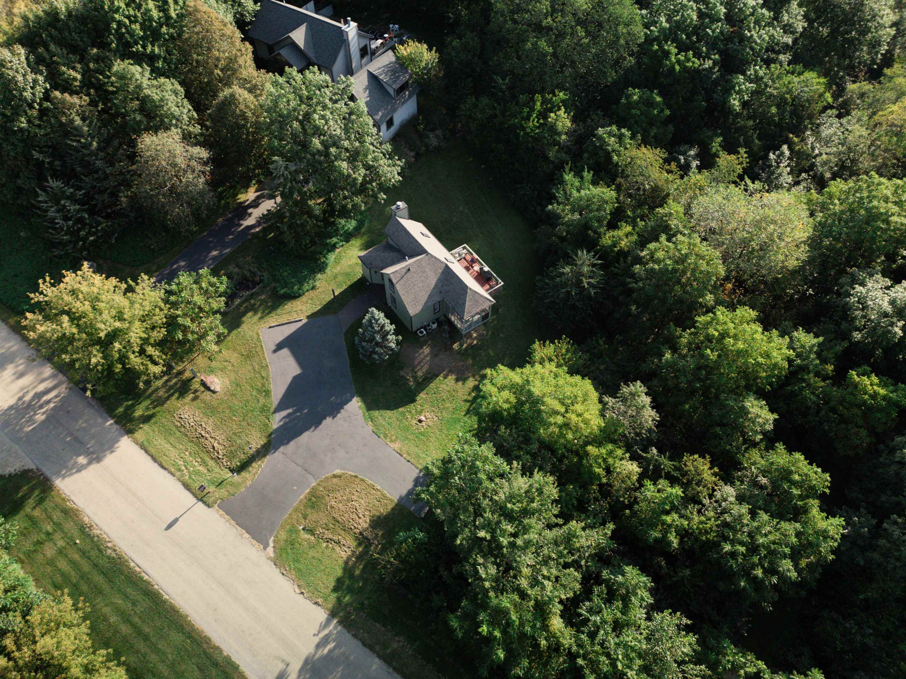14 Timberon Trail Galena, IL 61036 - Photo 28 of 31 an aerial view of a house with a yard and mountain view in back