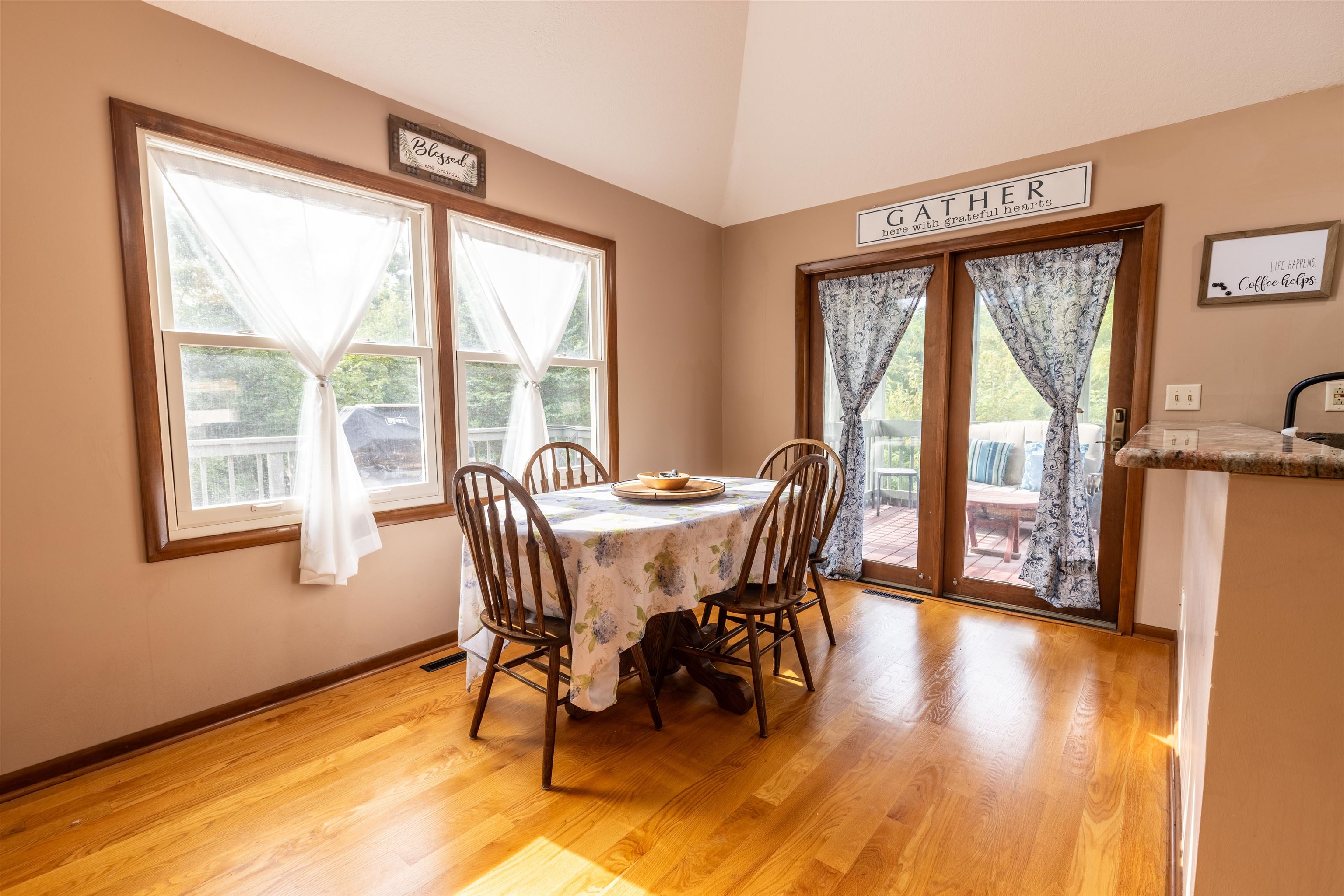 14 Timberon Trail Galena, IL 61036 - Photo 10 of 31 a view of a dining room with furniture and windows