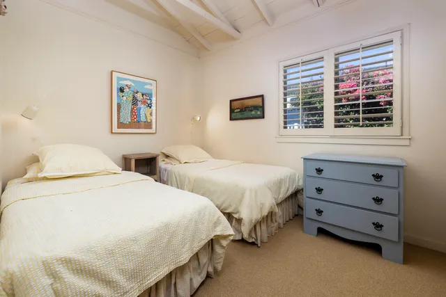 a view of a livingroom with wooden floor and outdoor space