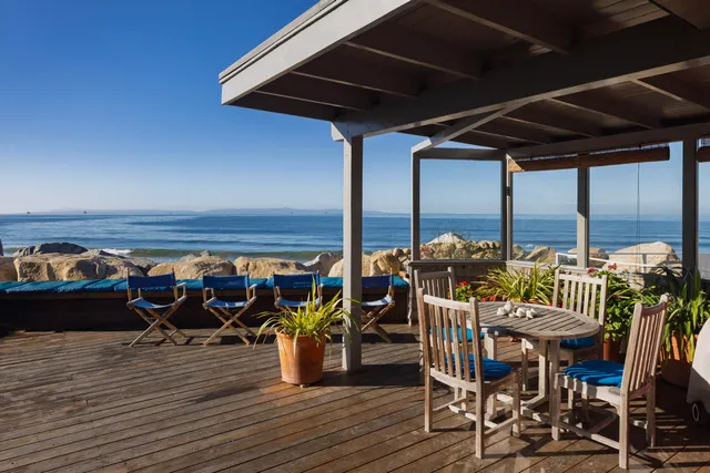 an aerial view of a house with a big yard