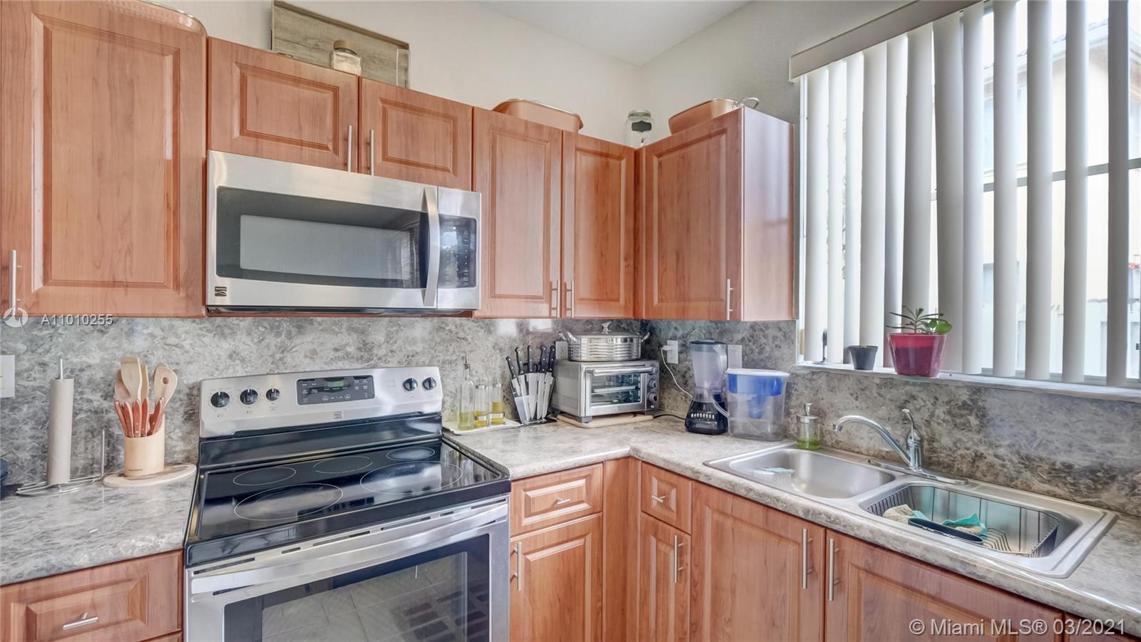 6980 Northwest 177th Street, Unit L102 Hialeah, FL 33015 - Photo 17 of 45