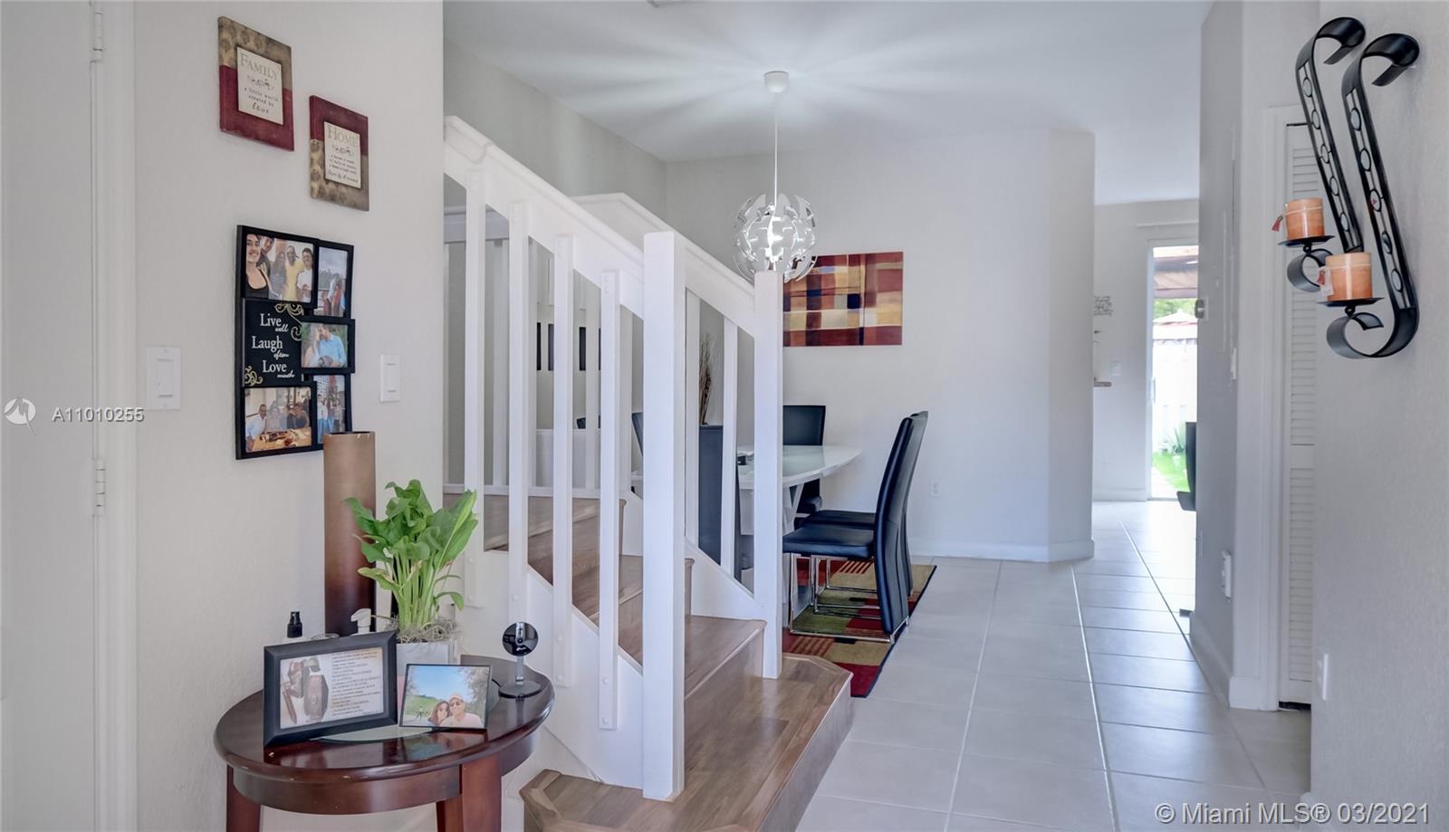 6980 Northwest 177th Street, Unit L102 Hialeah, FL 33015 - Photo 4 of 45