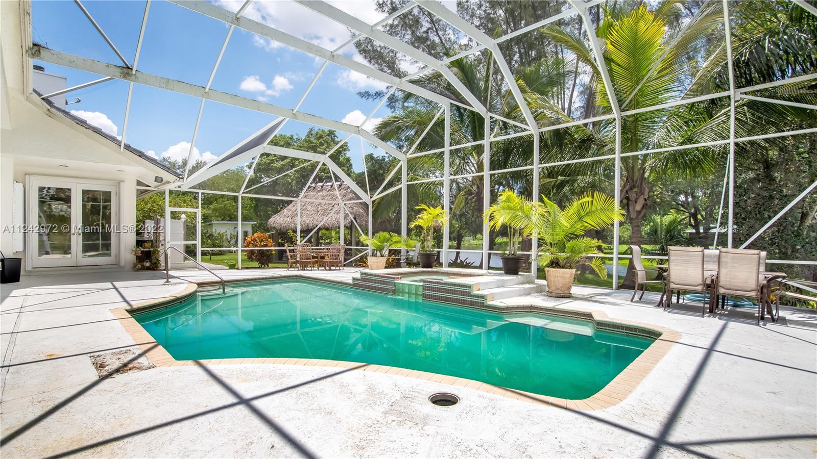 20310 Southwest 48th Street Southwest Ranches, FL 33332 - Photo 17 of 25 a view of a backyard with sitting area