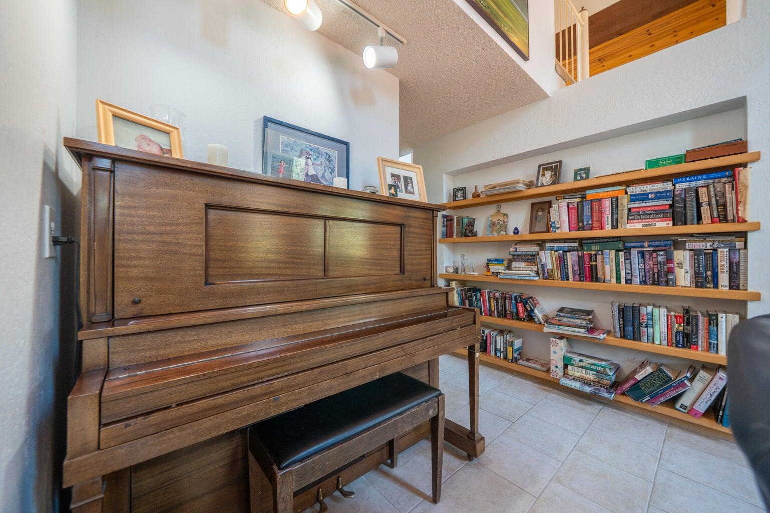 8846 Goldstone Lane Redding, CA 96001 - Photo 14 of 64 a reading room with furniture and a book shelf