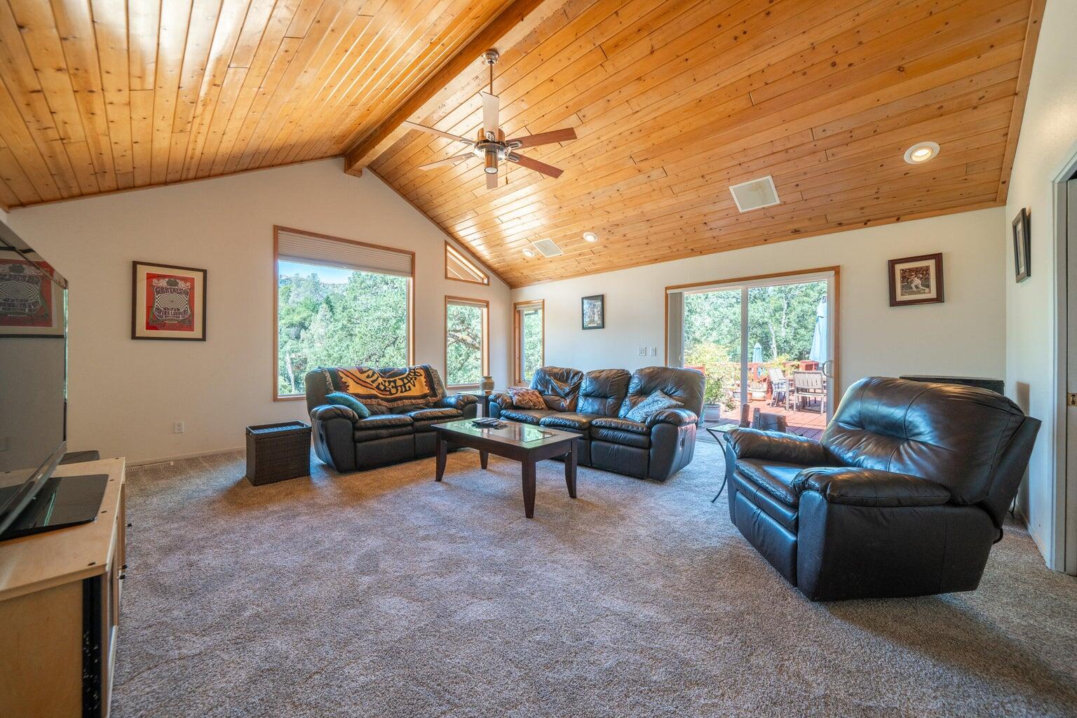 8846 Goldstone Lane Redding, CA 96001 - Photo 24 of 64 a living room with furniture and a large window