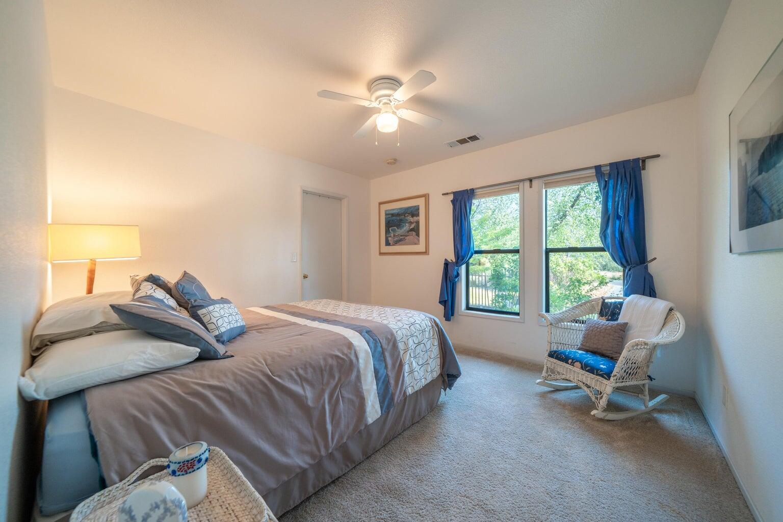 8846 Goldstone Lane Redding, CA 96001 - Photo 35 of 64 a bedroom with a bed and a window