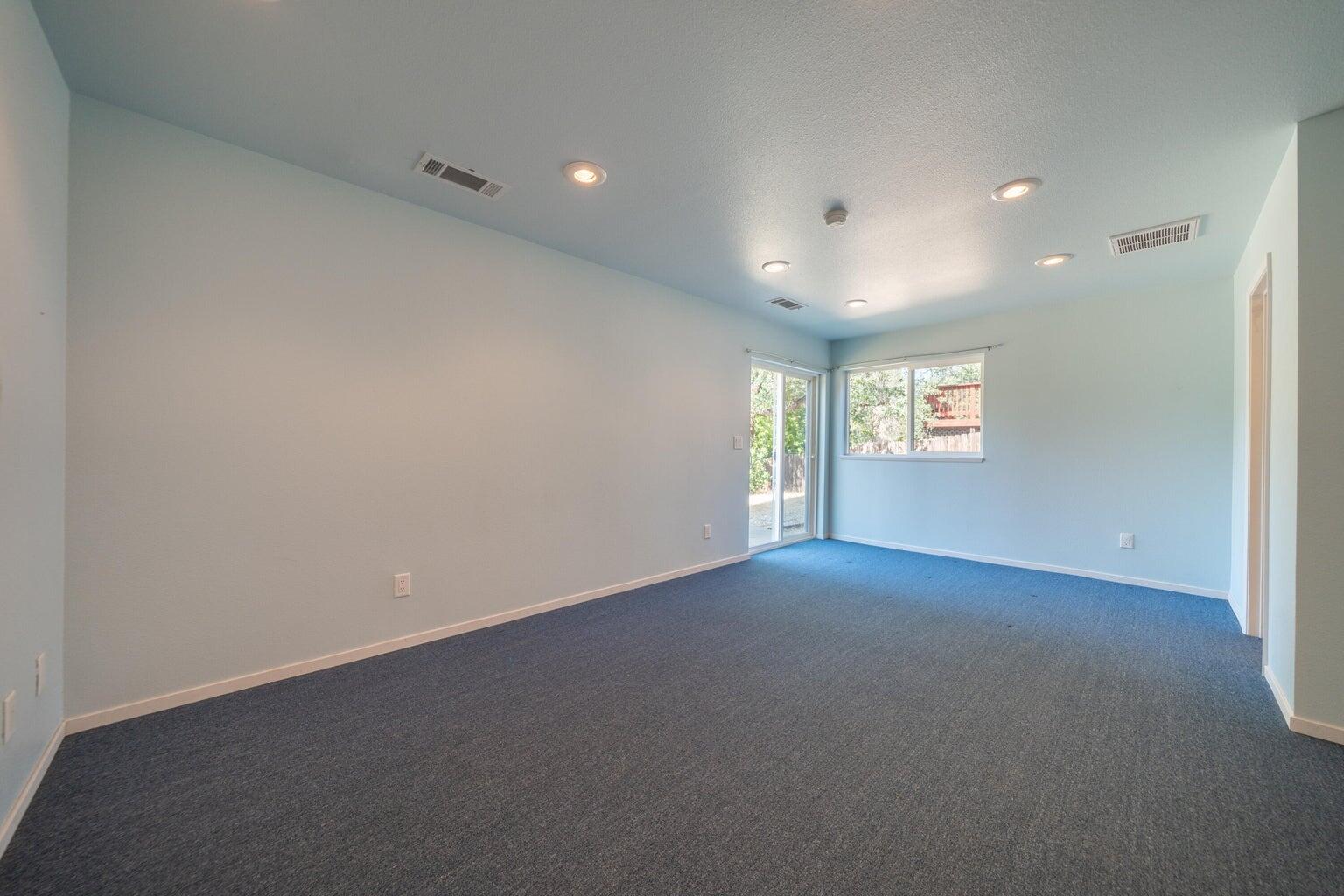8846 Goldstone Lane Redding, CA 96001 - Photo 40 of 64 an empty room with windows