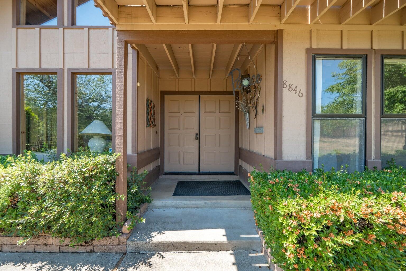 8846 Goldstone Lane Redding, CA 96001 - Photo 4 of 64 a view of a entryway door of the house