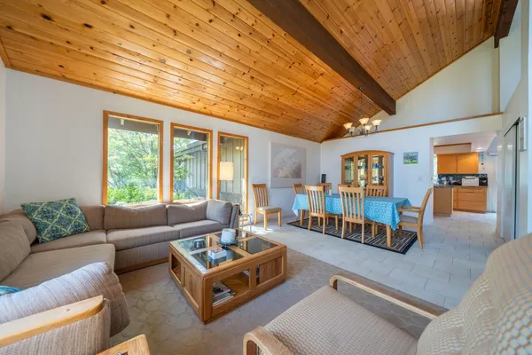 a living room with furniture and a couch