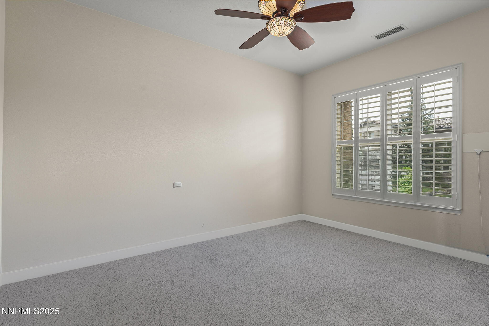 6225 Elk Ivory Drive Reno, NV 89511 - Photo 23 of 44 a view of an empty room with a window