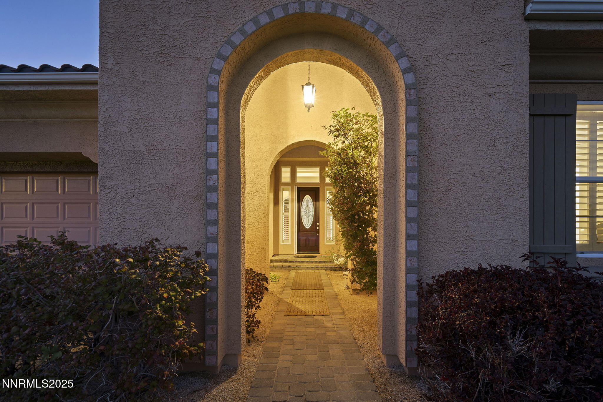6225 Elk Ivory Drive Reno, NV 89511 - Photo 34 of 44 a view of a entryway door of the house