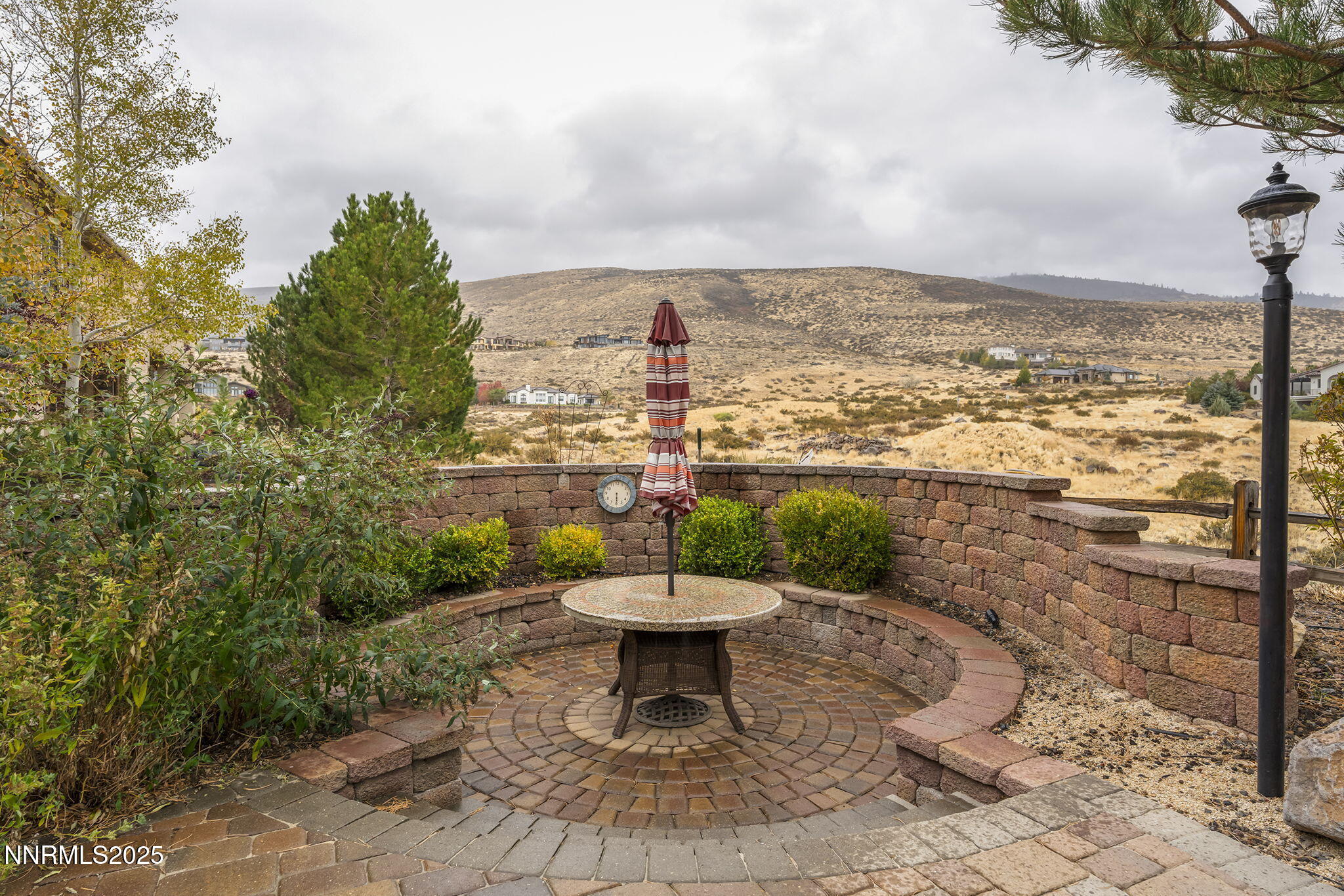 6225 Elk Ivory Drive Reno, NV 89511 - Photo 40 of 44 a view of a lake with a terrace