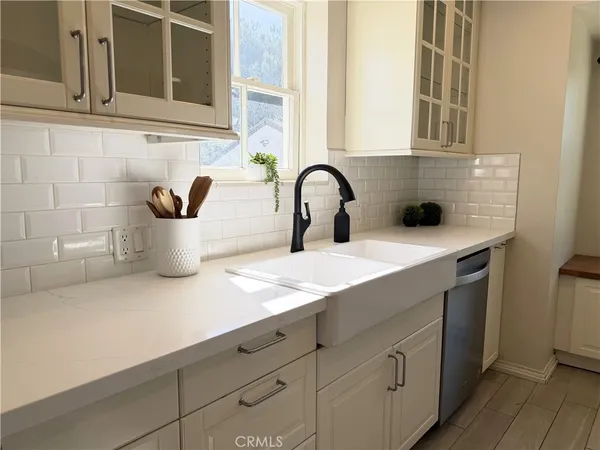 a close view of sink and mirror