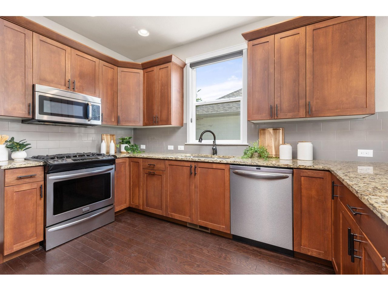 2905 68th Avenue Greeley, CO 80634 - Photo 9 of 40 Kitchen with Gas Stove