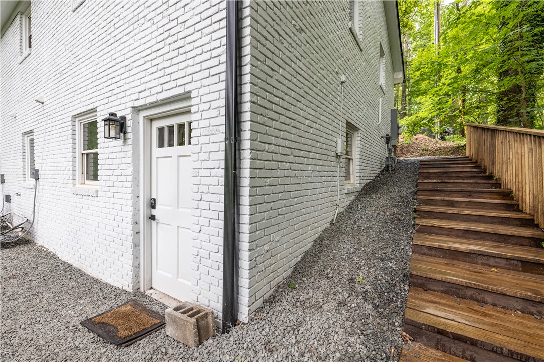 309 Woodland Way Clemson, SC 29631 - Photo 32 of 43 This charming home features a crisp brick exterior and convenient outdoor access.