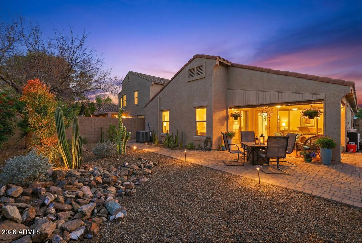 2829 East Park View Lane Phoenix, AZ 85024 - Photo 19 of 20 a backyard of a house with table and chairs