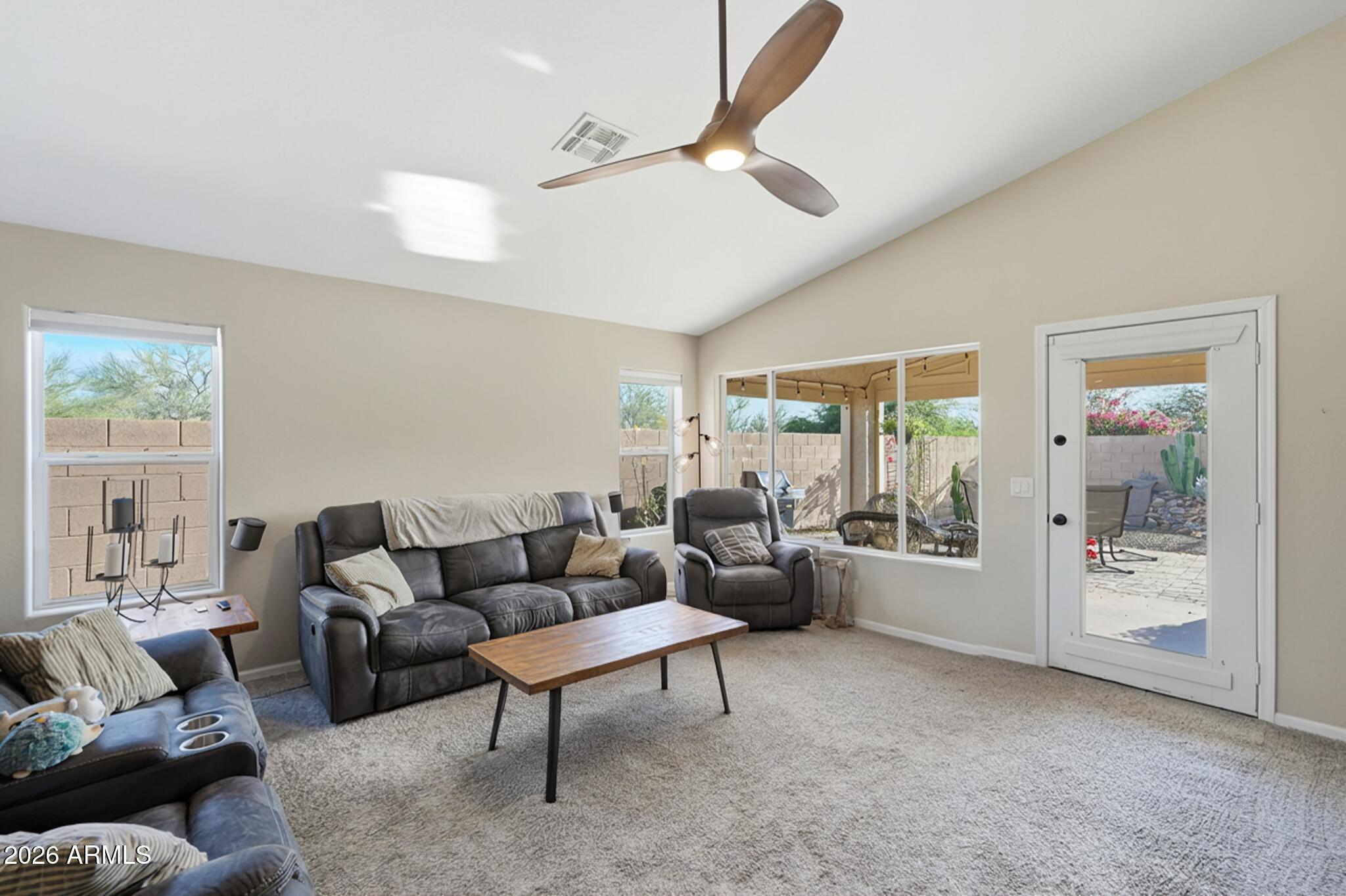 2829 East Park View Lane Phoenix, AZ 85024 - Photo 6 of 20 a living room with furniture and a large window