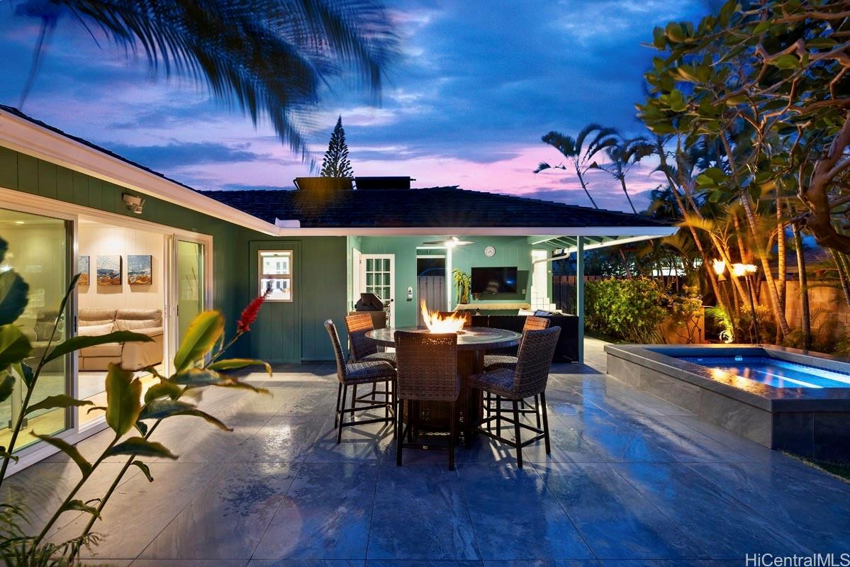 49 Pilipu Place Kailua, HI 96734 - Photo 22 of 25 View from Primary Bedroom out to Patio w/ Hot Tub