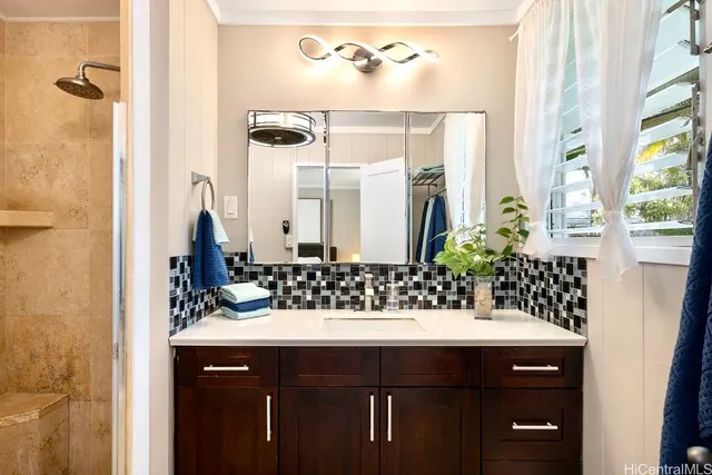 a bathroom with a sink and a mirror