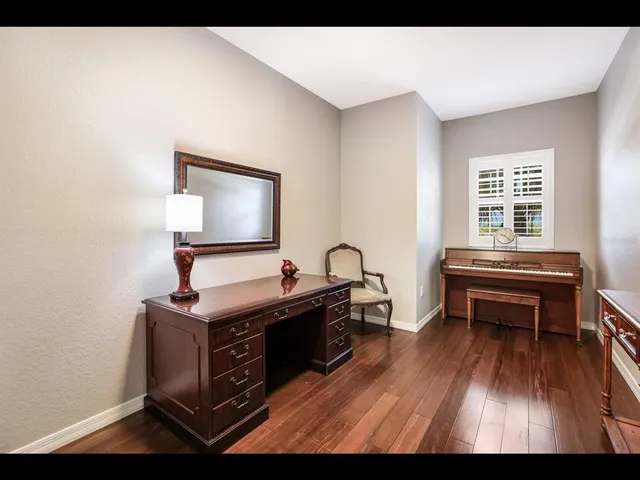 a view of a livingroom with furniture and front door