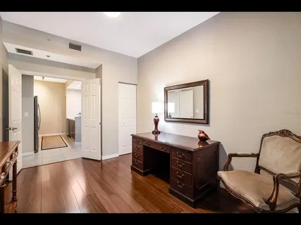 a bedroom with bed and window
