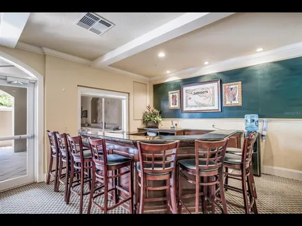 a view of living room filled with furniture and window