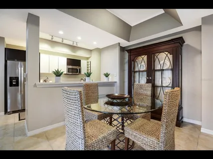 a kitchen with stainless steel appliances a refrigerator sink and stove