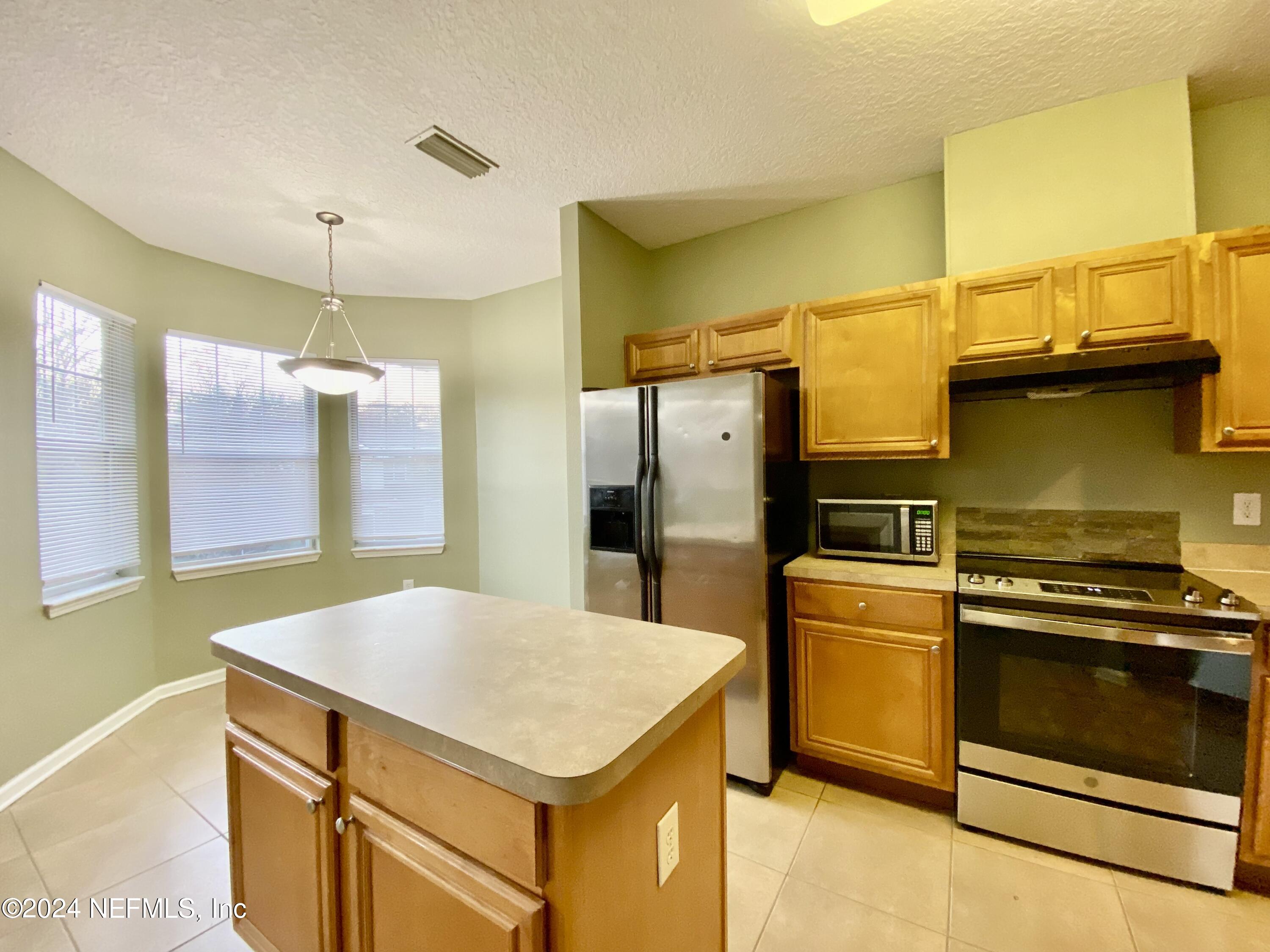 5663 Greenland Road, Unit 304 Jacksonville, FL 32258 - Photo 4 of 26 IMG_2705