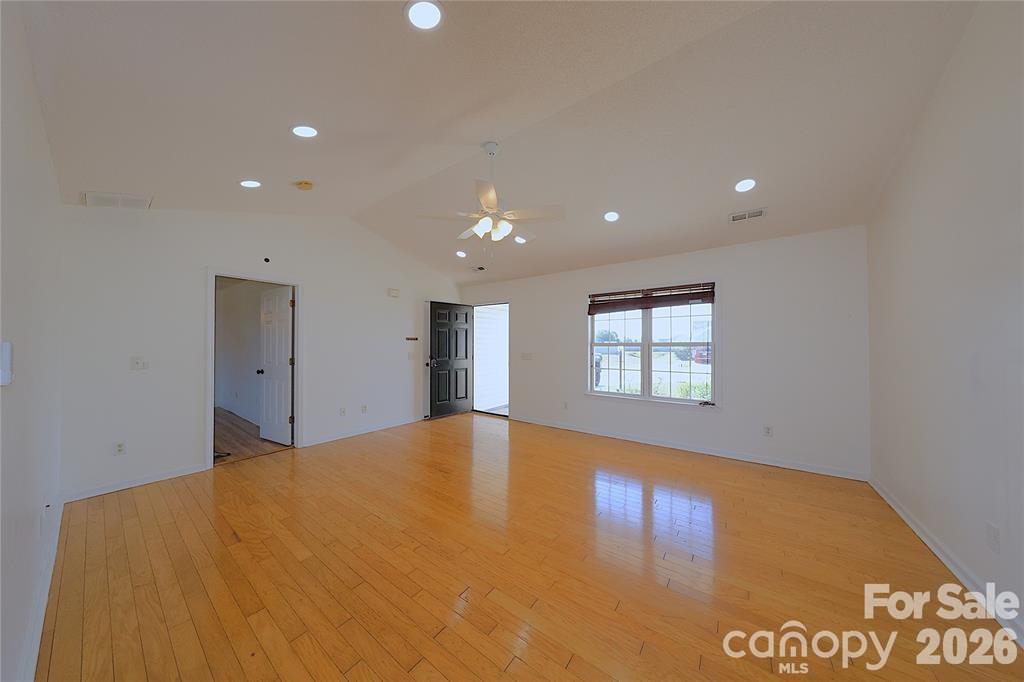 7456 Courtney Pines Road Wilmington, NC 28411 - Photo 6 of 16 a view of an empty room