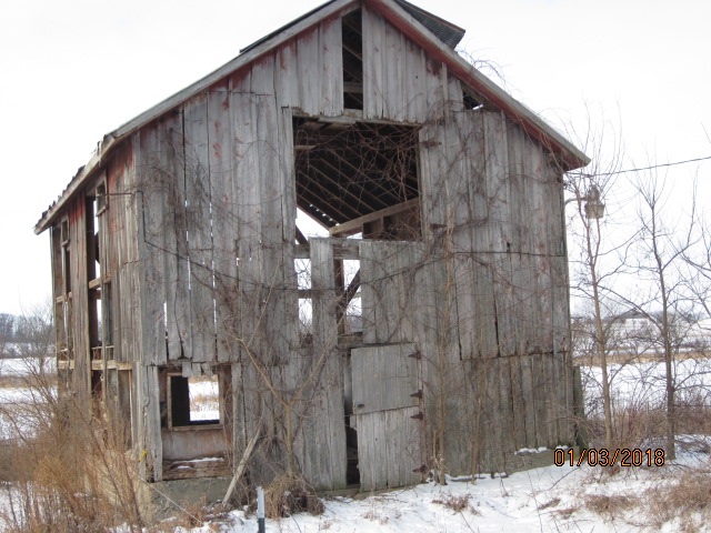 8982 East Maize Road Rock City, IL 61070 - Photo 11 of 25 a view of a wooden door of the house